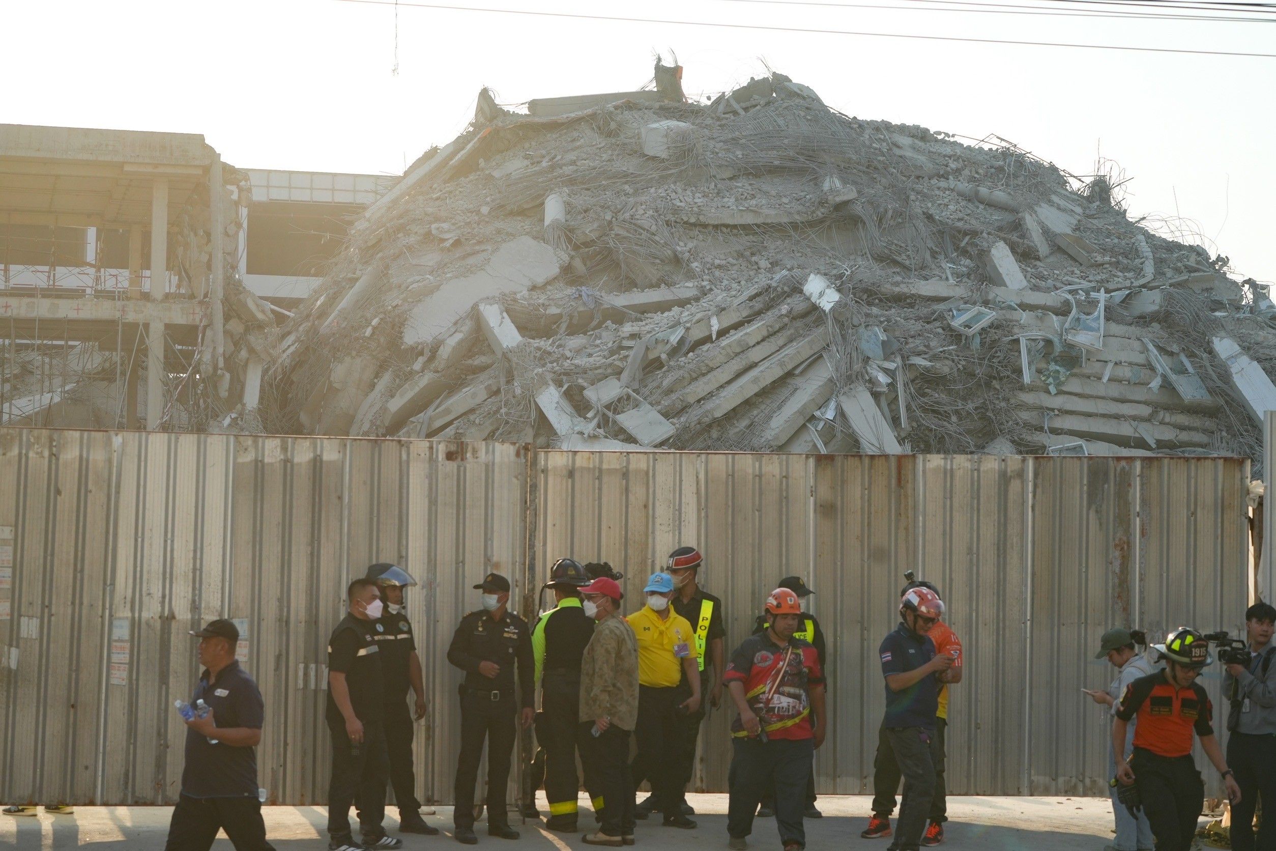 Search underway as three killed, dozens trapped in Bangkok building ...